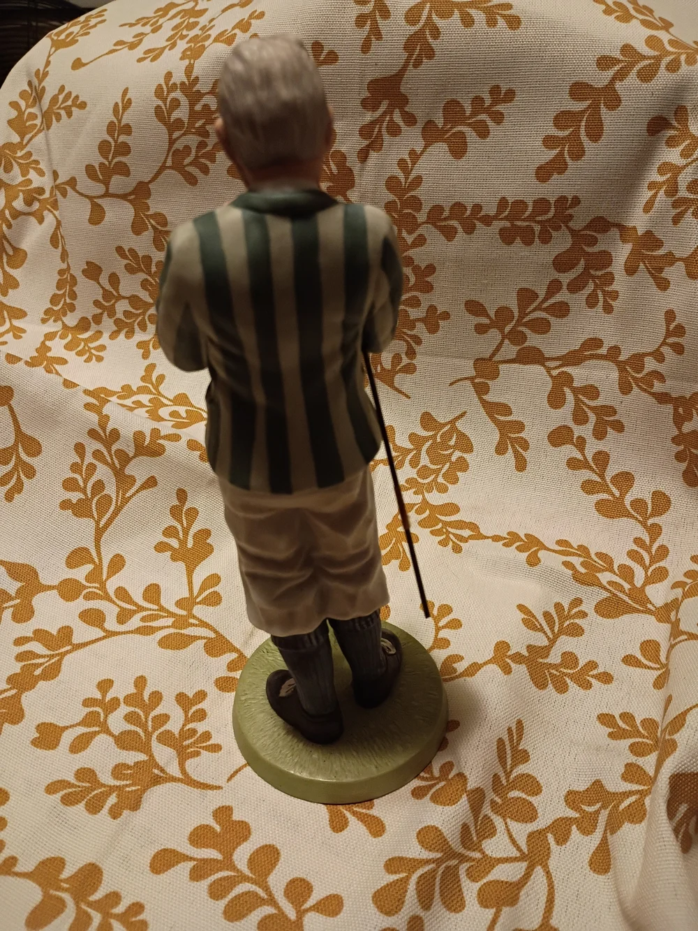 Norman Rockwell Ceramic Figurine in Cream and Green